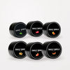 Daily Smile Ultimate Flavor Bundle, 6 potjes actieve kool tandpoeder in alle smaken op een lichte studioachtergrond