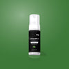 Daily Smile tandenbleek schuim Mint op een groene achtergrond